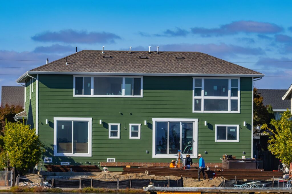 A roofer at work on an American home